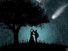 two people standing under a tree in front of the stars