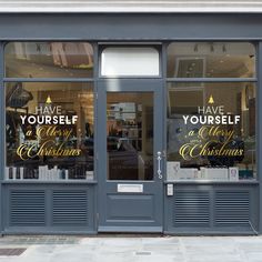 a store front with two large windows that say live yourself, love yourself and merry christmas