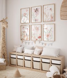 a room with several pictures on the wall and stuffed animals in baskets next to it