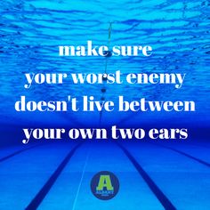 an underwater swimming pool with the words make sure your worst enemy doesn't live between your own two ears