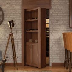 a wine rack in the corner of a room with chairs and a clock on the wall