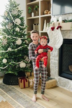 Embrace the magic of the holiday season with our Green Plaid Bamboo Cozy Set, perfect for making cherished memories with the whole family. Crafted from ultra-soft and breathable bamboo fabric, this festive set ensures a cozy and comfortable night's sleep. Available in sizes from 18 months to 11/12 years, it's perfect for your little ones, while matching adult pajamas let everyone join in on the fun. Ideal for Christmas morning photos, holiday movie nights, or simply enjoying the winter season to Graphic Onesies, Diaper Bag Accessories, Nursing Accessories, Adult Pajamas, Toddler Fall, Nursery Accessories, Onesie Pajamas, Cozy Pajamas, Baby Bottoms