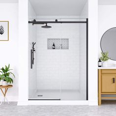 a bathroom with white walls and tile flooring, including a walk - in shower