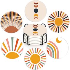 an assortment of plates with different designs on them