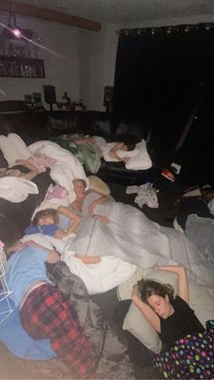 a group of people sleeping on the floor