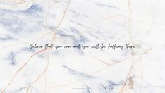 marble with the words believe that you can and you will be halfway there