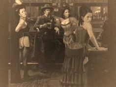 an old photo of three women standing in front of a bar with mannequins