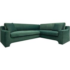 a large green couch with pillows on it's back and the seat facing outward