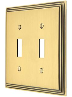 two light switch plates are shown in gold