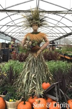 an image of a woman in a dress made out of plants