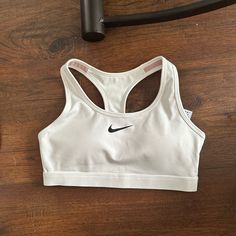 Not Worn. White Nike Sports Bra Nike Sportswear For Sports Events, Nike Sporty Activewear For Sports Events, Nike White Fitted Sports Bra, Fitted White Nike Sports Bra, Nike Fitted White Sports Bra, White Sweat-resistant Sports Bra, Nike Sportswear For Light Sports Activities, Nike White Sports Bra For Running, Nike Activewear For Light Sports