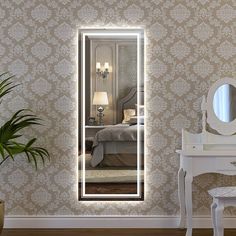 a mirror that is on the side of a wall next to a desk and chair