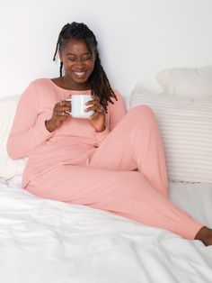 The ultimate in comfort for nursing moms. Crafted from super-soft, stretchy Hacci fabric – a lightweight, sweater-like knit with an ultra-cozy feel – this luxe lounge & pajama set keeps you warm while simplifying nursing. The crewneck top with fitted cuffs features easy lift-up feeding access with a V-shaped underlayer, while the jogger-style pant offers an adjustable waistband for a perfect fit. Whether you’re nursing, pumping, sleeping, or lounging, this must-have set is designed to keep you comfy and cozy around the clock.  To breastfeed, lift up the nursing panel and pull down either side of the inner V-neckline Ribbing detail at cuffs, neckline, and waistband   Elastic waistband with functional drawcord – perfect for your changing body! Convenient pockets to hold your essentials Great Nursing Pajama Set, Clothes For Fall, Nursing Pajamas, Delivery Gown, Post Partum Outfits, Luxe Lounge, Pajama Lounge, Style Pant, Best Pajamas