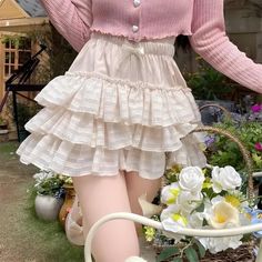 This charming skirt showcases delicate ruffles and elegant bows, perfect for a feminine and playful look. The layered design adds volume and movement, making it a standout piece in any wardrobe. Pair it with a cute top or blouse for a sweet and stylish outfit. Ideal for garden parties, casual outings, or any occasion where you want to feel both cute and chic. Coquette aesthetic Elastic waistband Lined interior Soft and flowy fabric Vintage-inspired Mesh Mini Skirt, Mini Skirt Summer, Short Summer Skirts, Ruffled Mini Skirt, Crop Pullover, Bloomers Shorts, Ruffle Mini Skirt, Corset Bustier, Mori Girl