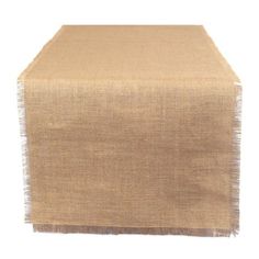 a brown table runner with fringes on it