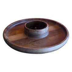 a wooden tray with a bowl on it