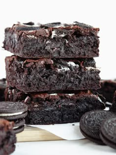 a stack of cookies and oreo brownies on top of each other