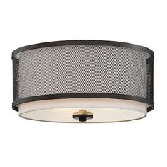 a semi flush light fixture with mesh shades on the bottom and an oval shade in the middle