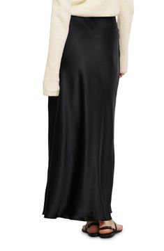 Elevate your ensemble in this high-waisted skirt crafted from a silky satin in a drapey maxi silhouette. 36" length (size 4US) Hidden side-zip closure 68% acetate, 32% viscose Dry clean or machine wash, dry flat Imported Satin Maxi Skirt, Satin Maxi, Black Midi Skirt, Dark Black, Side Zip, High Waisted Skirt, Maxi Skirt, Dry Clean, Nordstrom