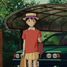 an anime character standing in front of a car