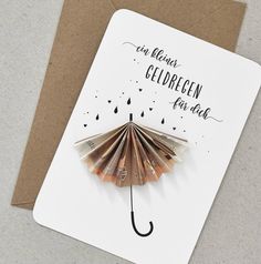 a greeting card with an umbrella on it