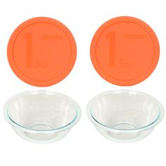 two bowls with lids are shown in front of one another and the third is empty