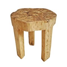 a small wooden stool made out of tree trunks on a white background with no one around it