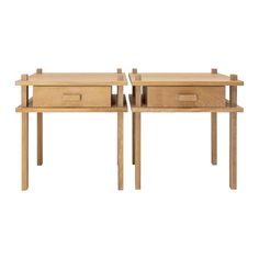 two wooden tables with drawers on each side