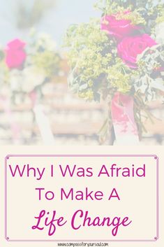 a vase filled with pink flowers sitting on top of a table next to a sign that says, why i was afraid to make a life change