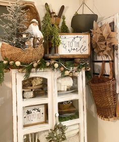 an old cabinet is decorated with christmas decorations