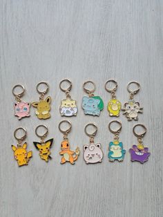 several different key chains with cartoon characters on them