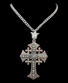 This amazing antique / vintage cross pendant has amazing style skillfully fashioned from 1000 pure silver likely of Jerusalem origin, the large pendant comes complete with heavy vintage sterling silver curb link chain.  Length approx - 23.5" Weight approx - 40 grams  Message me any questions ITEM - S1646 Ornate Cross Necklace With Intricate Design, Antique Cross Jewelry With Large Pendant, Antique Engraved Cross Pendant Necklace, Vintage Large Cross Pendant Jewelry, Antique Silver Oxidized Cross Necklace, Antique Cross Necklace With Large Pendant, Vintage Silver Engraved Cross Necklace, Antique Silver Cross Necklace With Oxidized Finish, Ornate Silver Cross Pendant Necklace