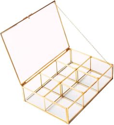 an open jewelry box on a white background with a chain hanging from the bottom to the top