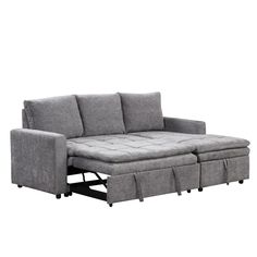 a gray couch with a pull out bed and storage underneath the arm rests on a black metal frame