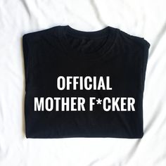 a black shirt that says official mother f'oker on it