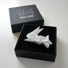 This Origami brooch is perfect for nature lovers and fans of modern jewellery. It adds whimsical charm and a touch of originality to both casual and formal looks. The black and white colours make it super versatile, complementing any outfit. Whether you are wearing it as a cute lapel pin on a regular day or as a special piece for a wedding ensemble, it will stand out wherever you go. Whether you're treating yourself, your mom, your friend, your wife, or your husband, this brooch is a bold additi Origami Rabbit, Wedding Lapel, Lapel Pins Wedding, Lover Wedding, Rabbit Lover, Brooches Handmade, Sweet Gifts, Black And White Colour, Formal Looks