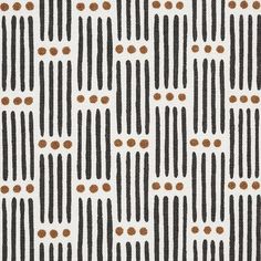 a black and white pattern with brown dots