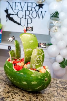 a watermelon boat made to look like a pirate ship