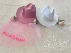 two hats with the word mr and mrs written on them, sitting next to each other