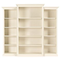 an empty white bookcase with three shelves