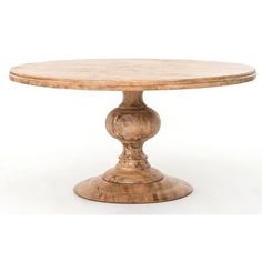 a round wooden table on a white background with no one around it or someone else