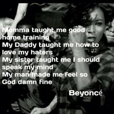 a woman singing into a microphone with the words'momma taught me good home training my daddy taught me how to love my haters