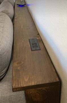 a long wooden table sitting on top of a couch