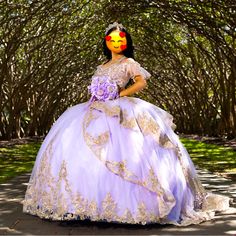 a woman in a purple dress with a yellow mask on her face is posing for the camera