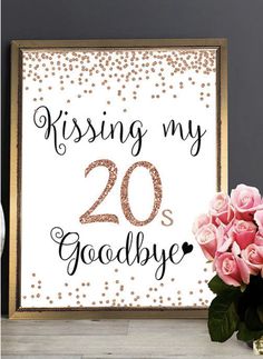 a white and gold framed sign that says, kissing my 20 goodbye with pink roses