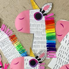 the paper unicorns are made with colored pencils