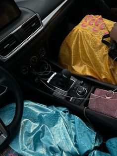 the inside of a car with various items in it