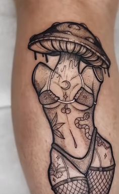 a woman's leg with an artistic tattoo design on the thigh and under her arm