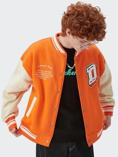 Exude a bold style with the "I Don't Give Damn" bomber jacket. Embellished with patterns, this unisex varsity jacket crafted from a cotton-polyester blend features snap-button front, and twin side pockets. Available in blue, orange, and black - a hoodless trendsetter for your closet. Embroidered patterns Men's & Women's jacket Varsity jacket made of technical fabric Snap-button at front Cotton, polyester Twin side pockets Pockets are sealed, gently pick up the lines to open Unisex No hood Ashbee wears XL and is 6'2 (188cm) Davis wears XL and is 6'1 (186cm) Billy wears XL and is 5'7 (173cm) School Jacket, Jeans Patchwork, Embroidered Patterns, Fall Sweaters For Women, Streetwear Jackets, Jogger Pants Casual, Streetwear Mode, Baseball Varsity Jacket, Cardigan Sweater Vest