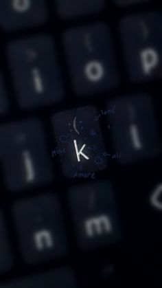 a keyboard with the letter k on it